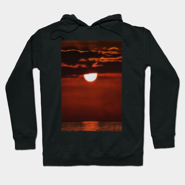 quickly setting sun off the coast of Bali Indonesia Hoodie by mister-john